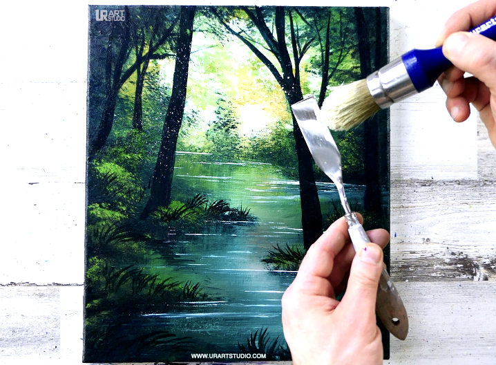 Nature’s Brushstrokes: Capturing a Vibrant Green Landscape with a Twisting River